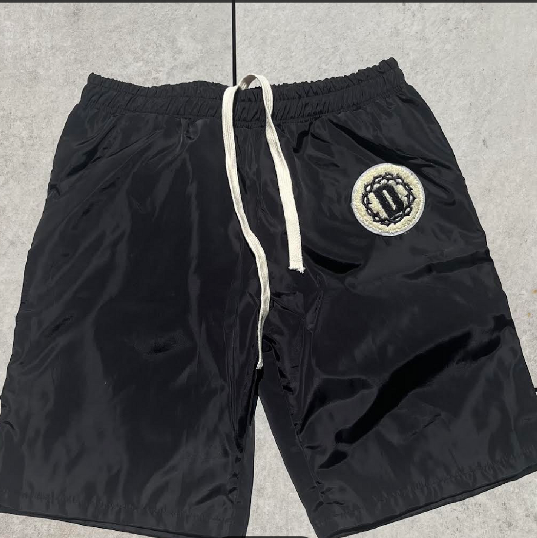 PANTALONCINI NERI CAMO